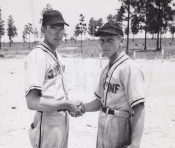 3rd Baseman Bielaczy congratulates Pitcher Moisen
